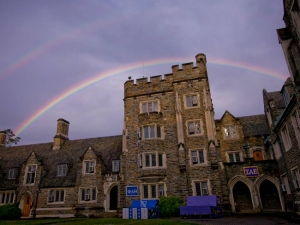 Photo of rainbow over a greek residence on Duke's campus