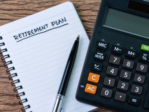 Stock photo of calculator, pen and notebook