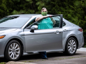 Photo by Alex Boerner of Duke employee, Shannon Robbins who was unable to drive for weeks after surgery.