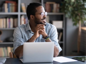 Photo ofMale on Computer HERO