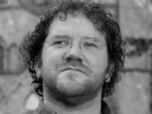Photo of Padraig O Tuama by Joran Martin Johansen for poets.org