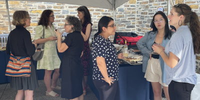 Faculty and graduate students enjoying the afternoon