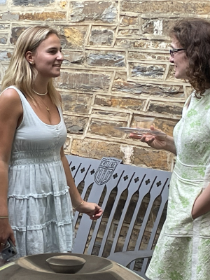 Professor Stan talking with a student