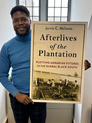 Professor Jarvis McInnis with Book Cover Poster